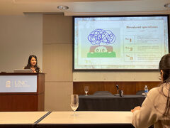 Vaneshi giving the KNIT10 talk (opens the full-size photo)